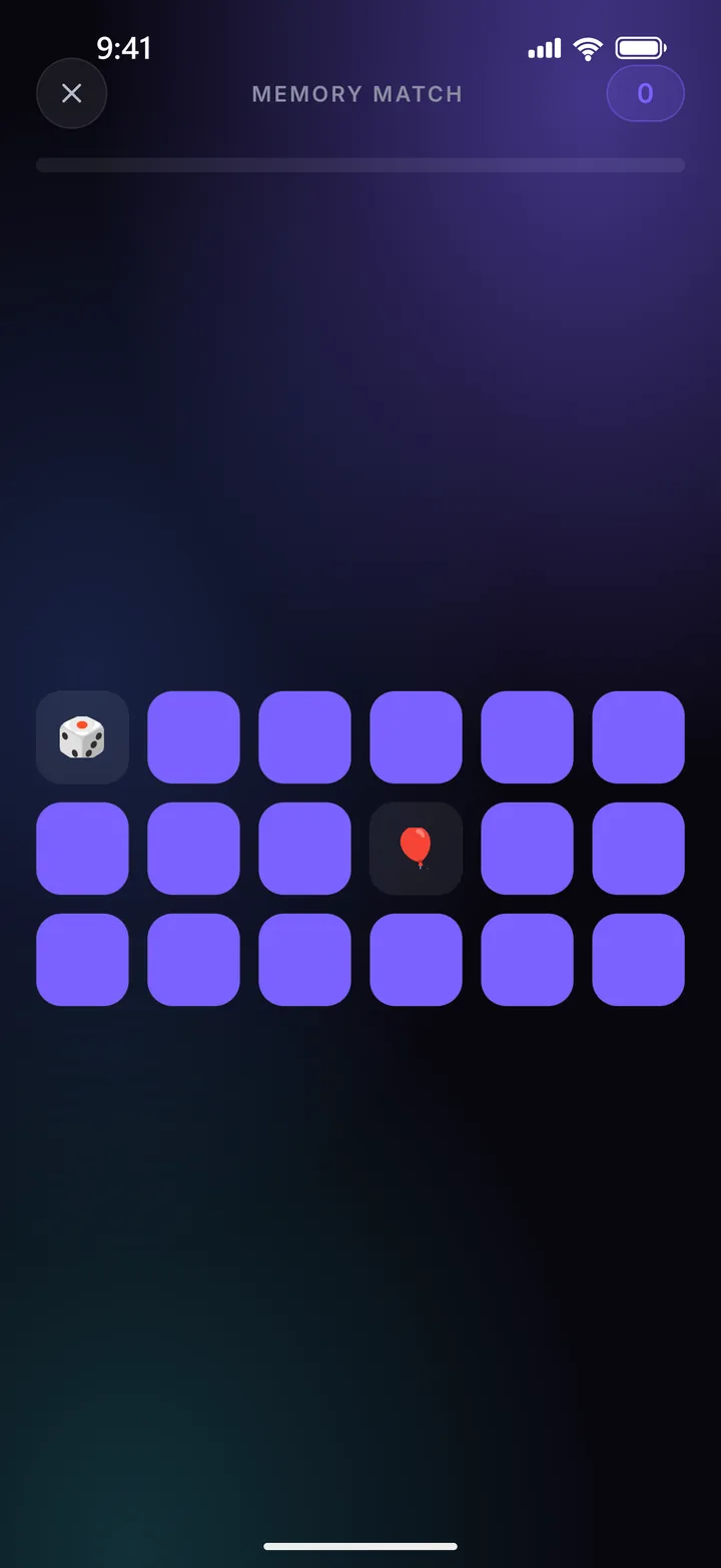 The Memory Match board: a grid of face-down violet cards with two turned over